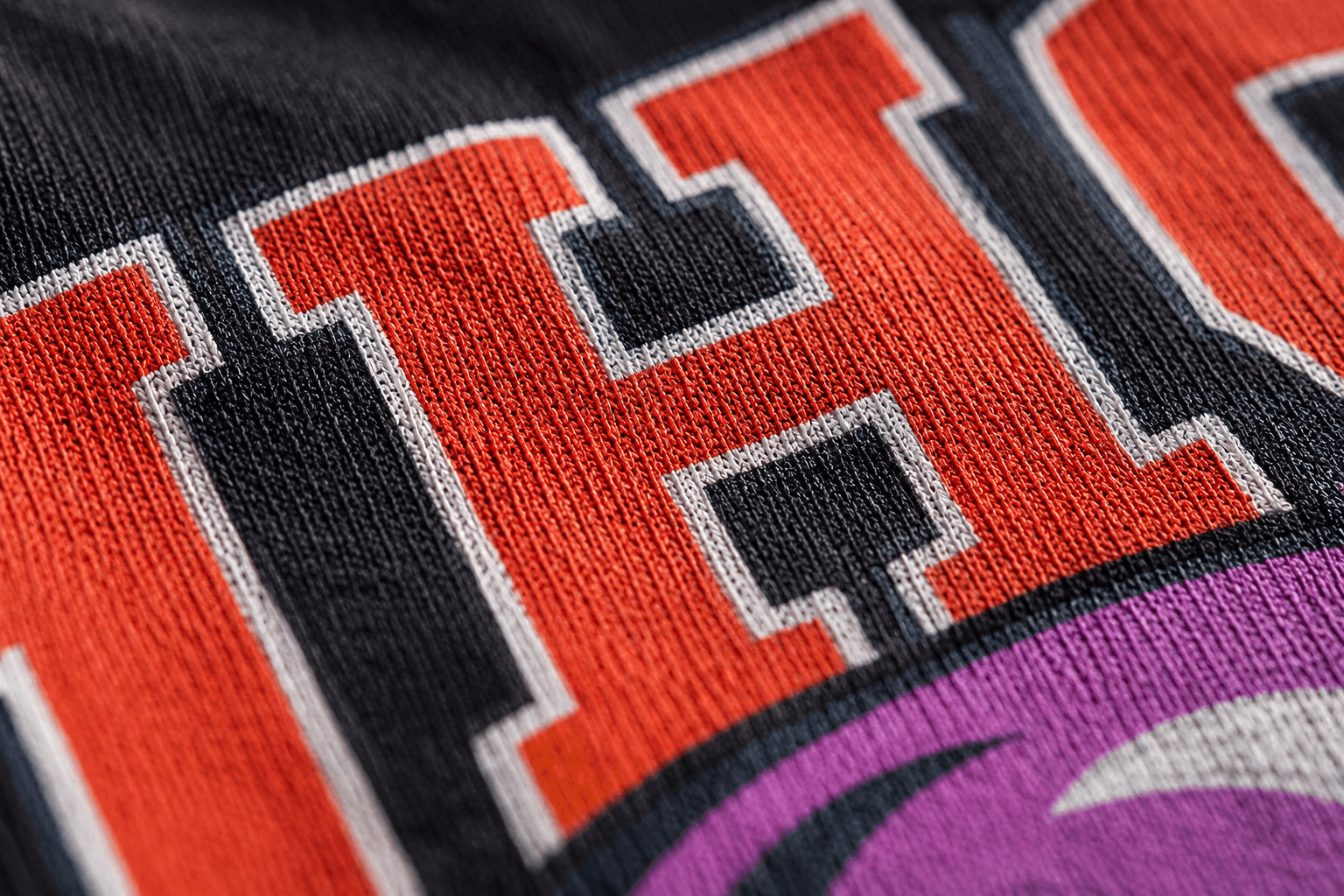 Bold DTG print on black tee